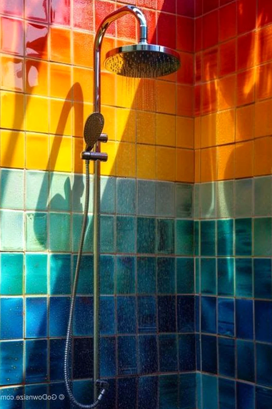 Sculptural tile detail brings rhythm to the wall, creating a mood that feels easy to enjoy.