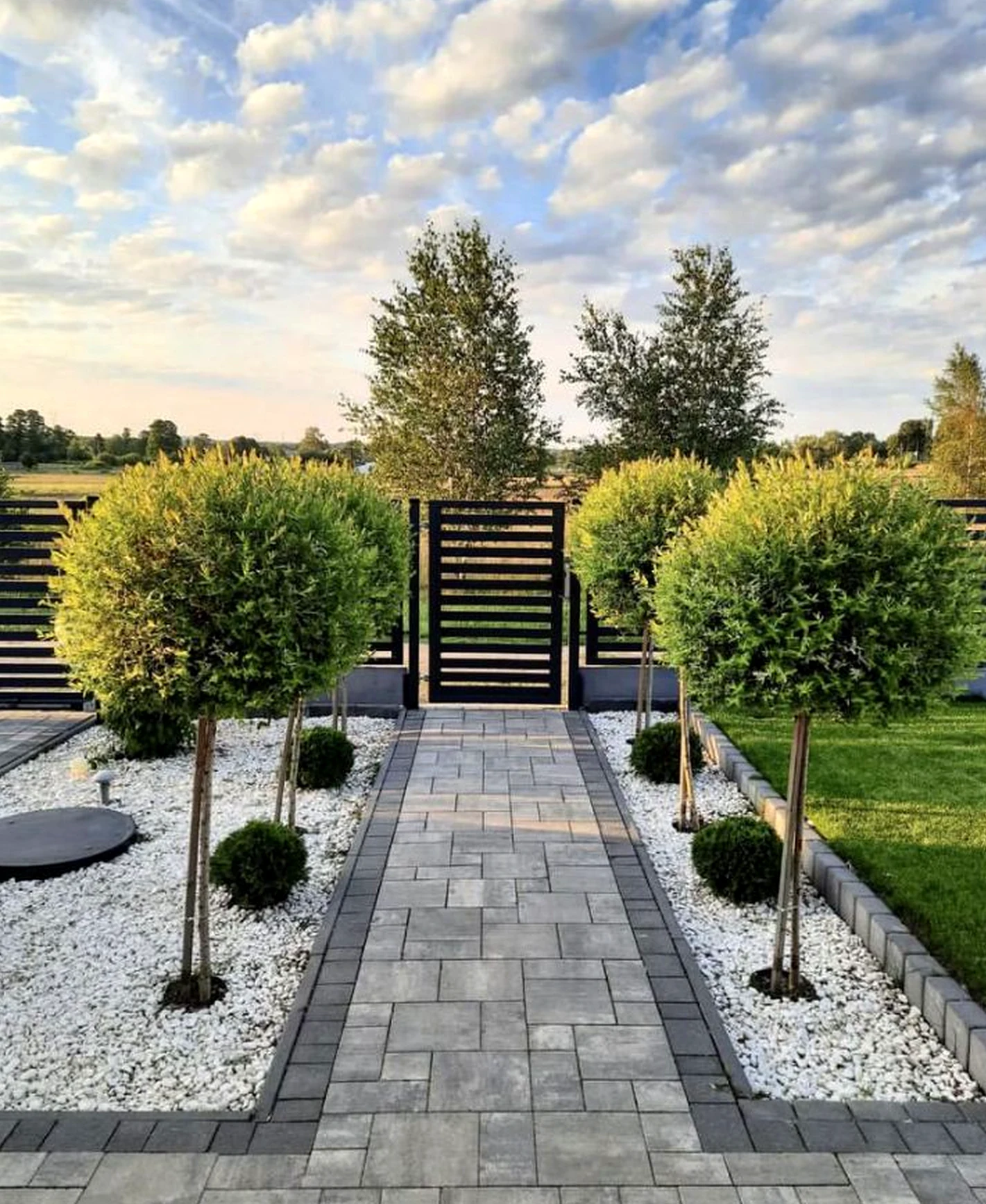 Colorful kitchen nook anchors the garden edge with rhythm, giving the view a mood that feels easy to enjoy.