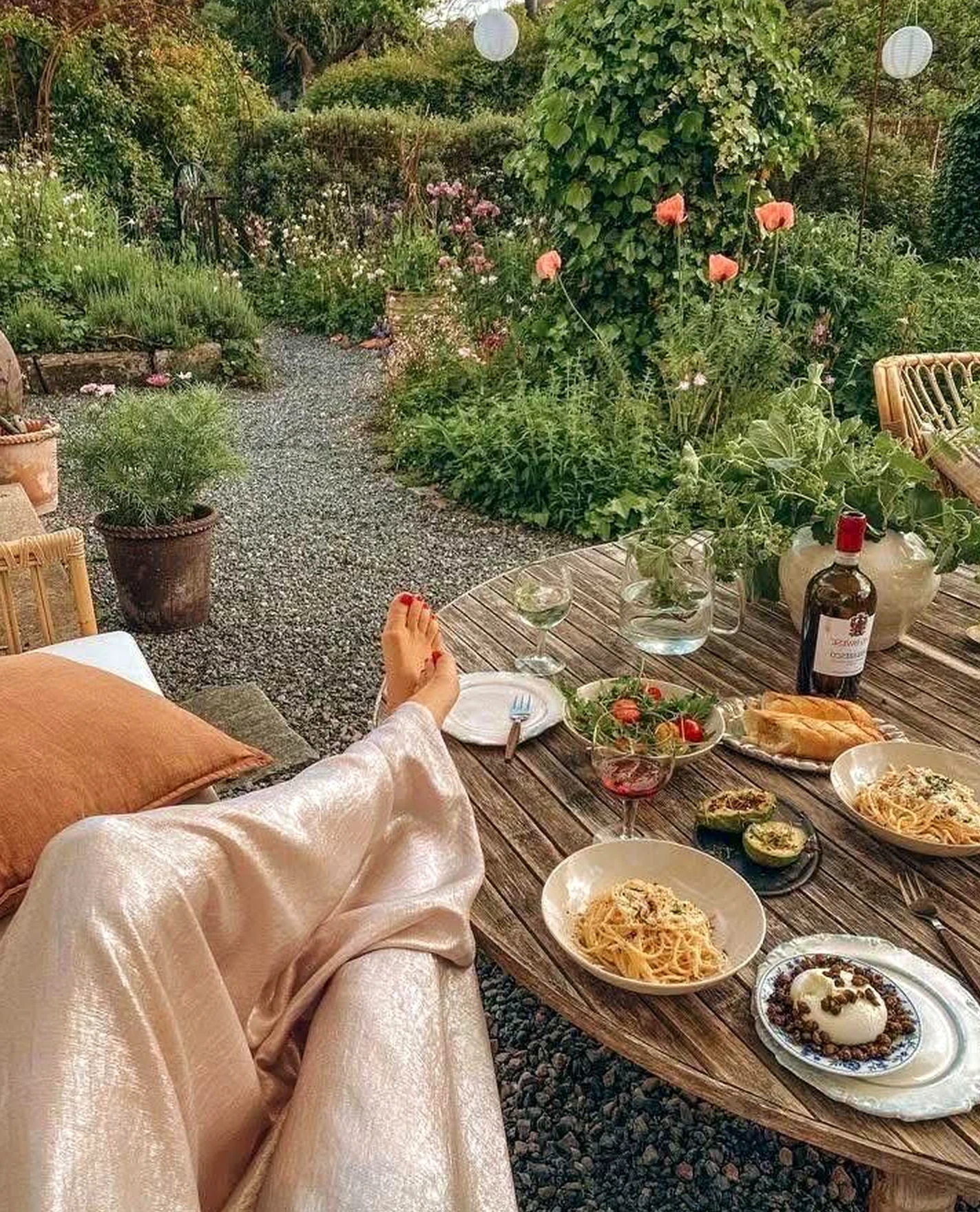 Tactile porch bench anchors the table with comfort, giving the view a mood that feels personal and relaxed.