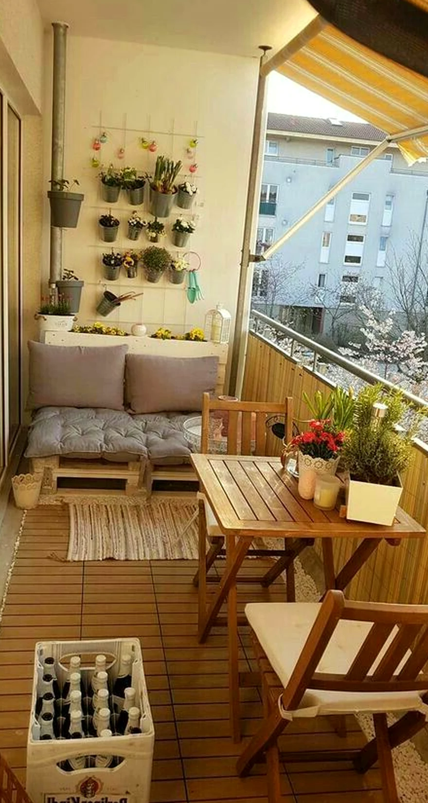 Balanced stone terrace gives the corner more warmth, so the whole view feels quietly finished.