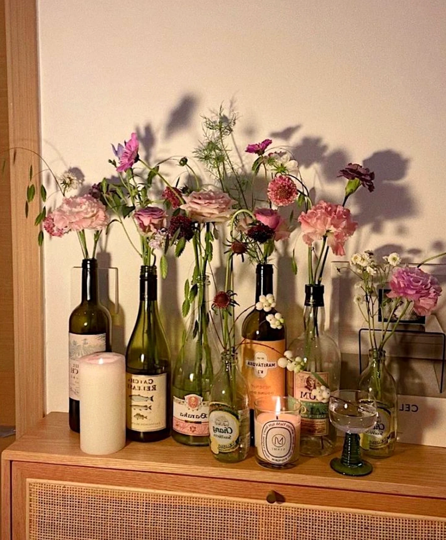 Crisp cabinet wall frames the composition with comfort, making the scene feel easy to enjoy.