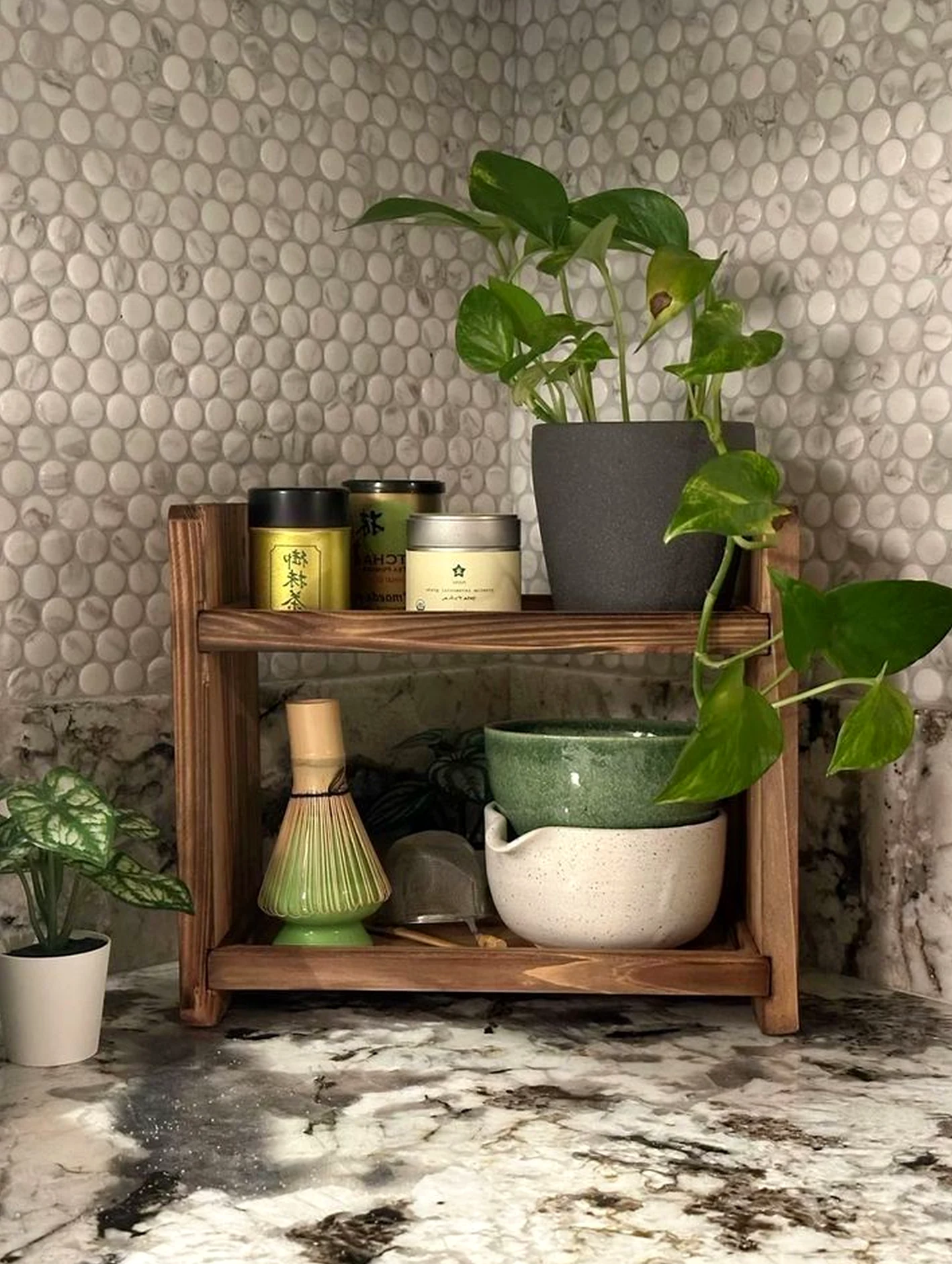 Leafy wooden deck brings a useful note of character, making the room feel easy to enjoy.